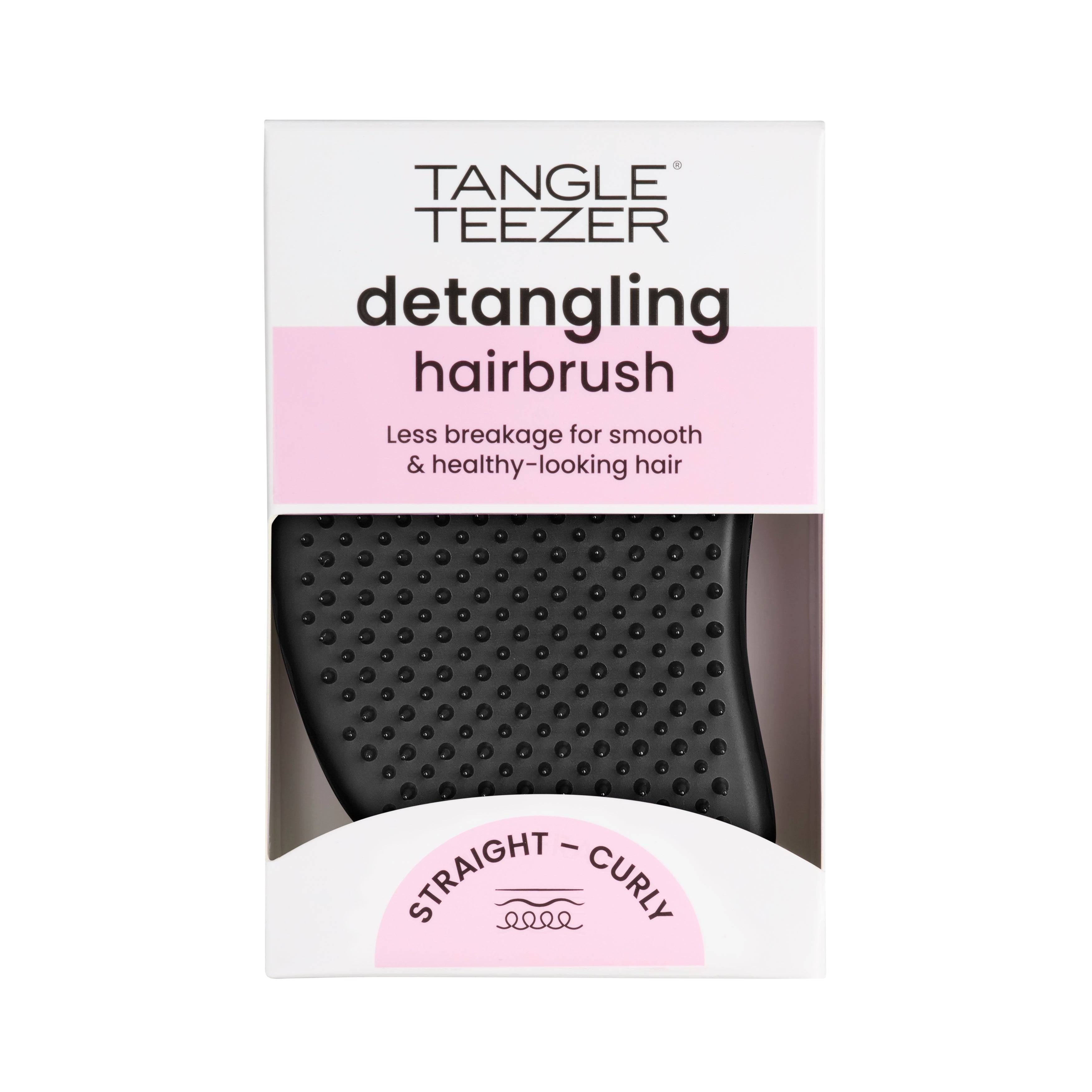 Tangle Teezer The Original Panther Black detangling hairbrush, designed for all hair types. Features two-tiered teeth technology to reduce breakage and smooth hair.