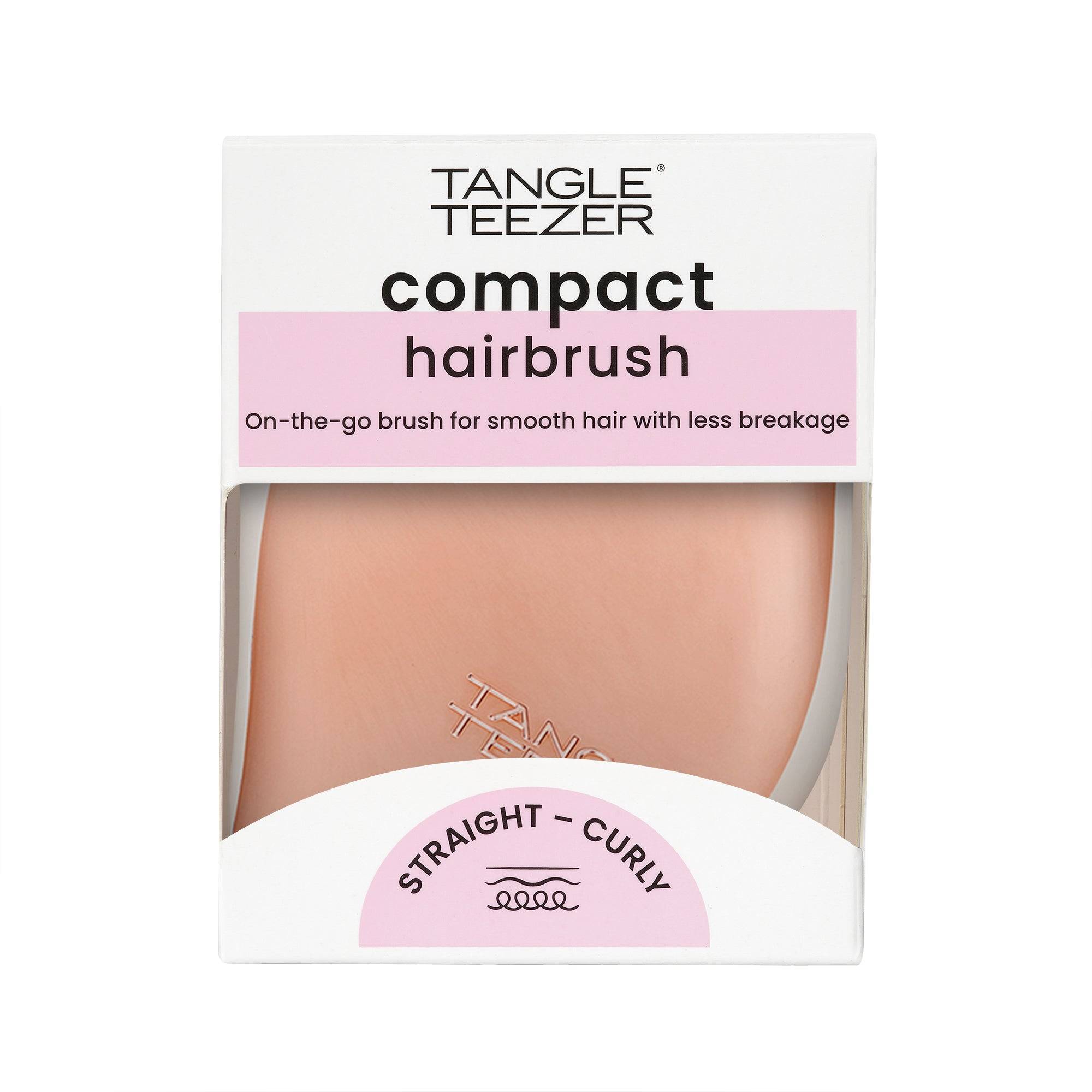 Tangle Teezer Compact Styler Rose Gold-Ivory hairbrush in packaging. Designed for detangling and smoothing all hair types with a protective cover.