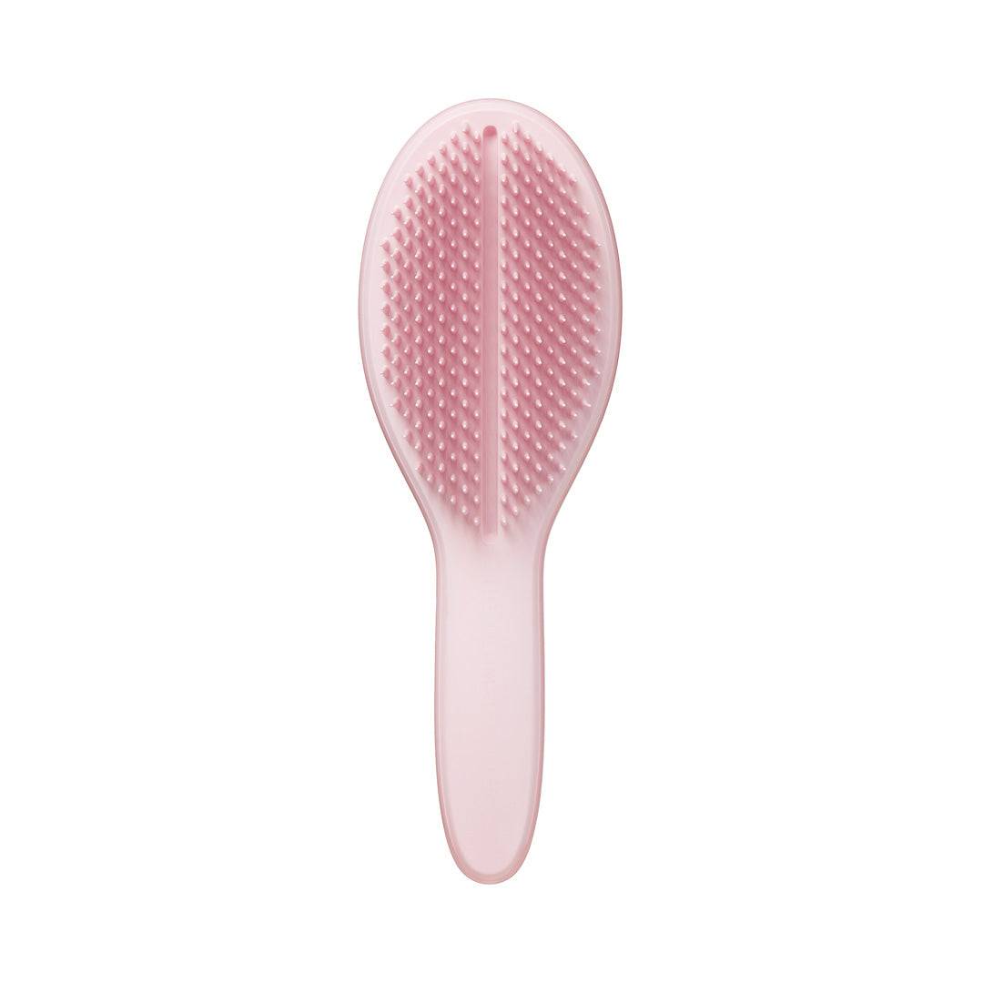 Back view of Tangle Teezer The Ultimate Styler Millennial Pink Hair Brush highlighting its innovative two-tiered teeth for reducing frizz and breakage.