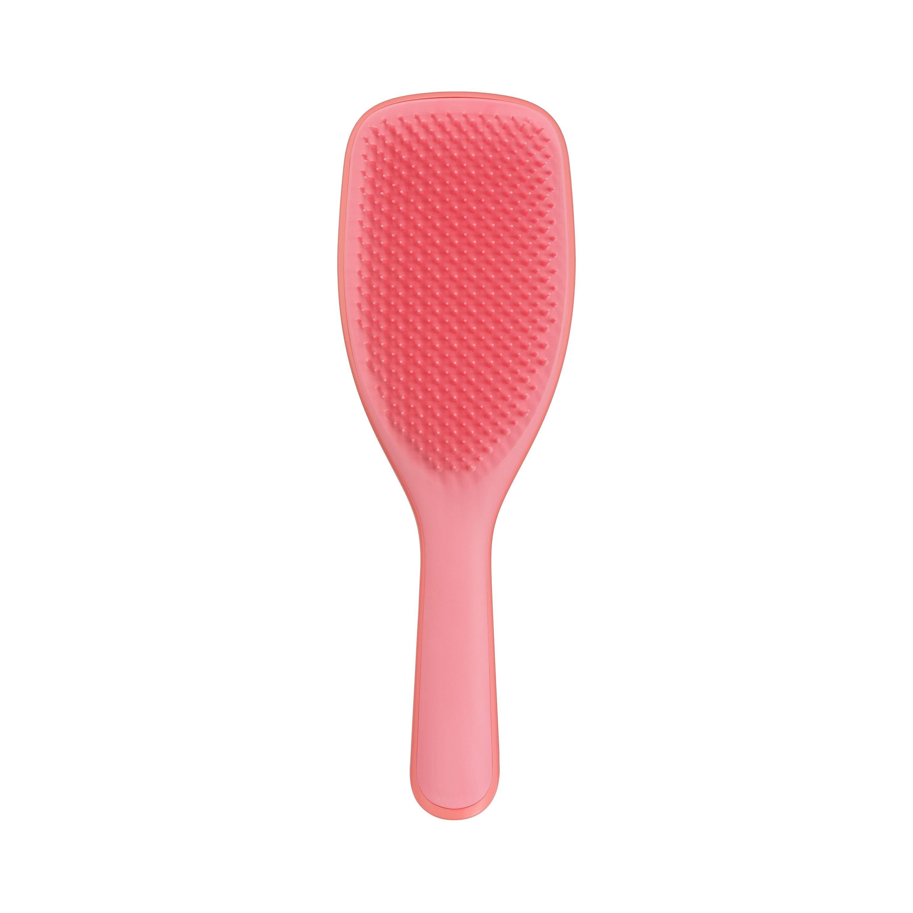 Tangle Teezer Large Ultimate Detangler in Salmon Pink, designed for wet hair. Features flexible two-tiered teeth for effortless detangling of all hair types.