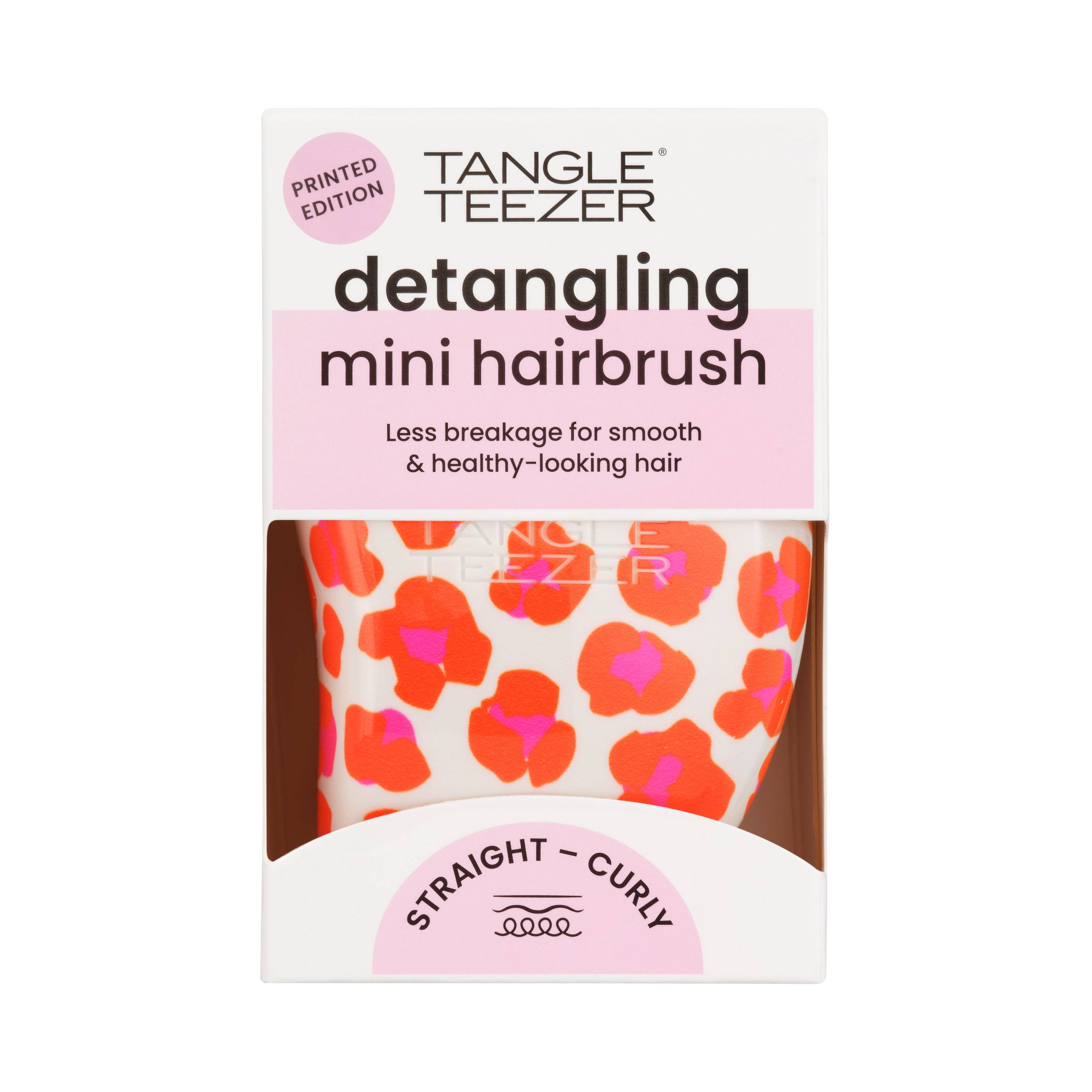 Tangle Teezer Original Mini Orange Multi-Printed hairbrush with a vibrant leopard print design. Compact and ideal for detangling all hair types with ease.