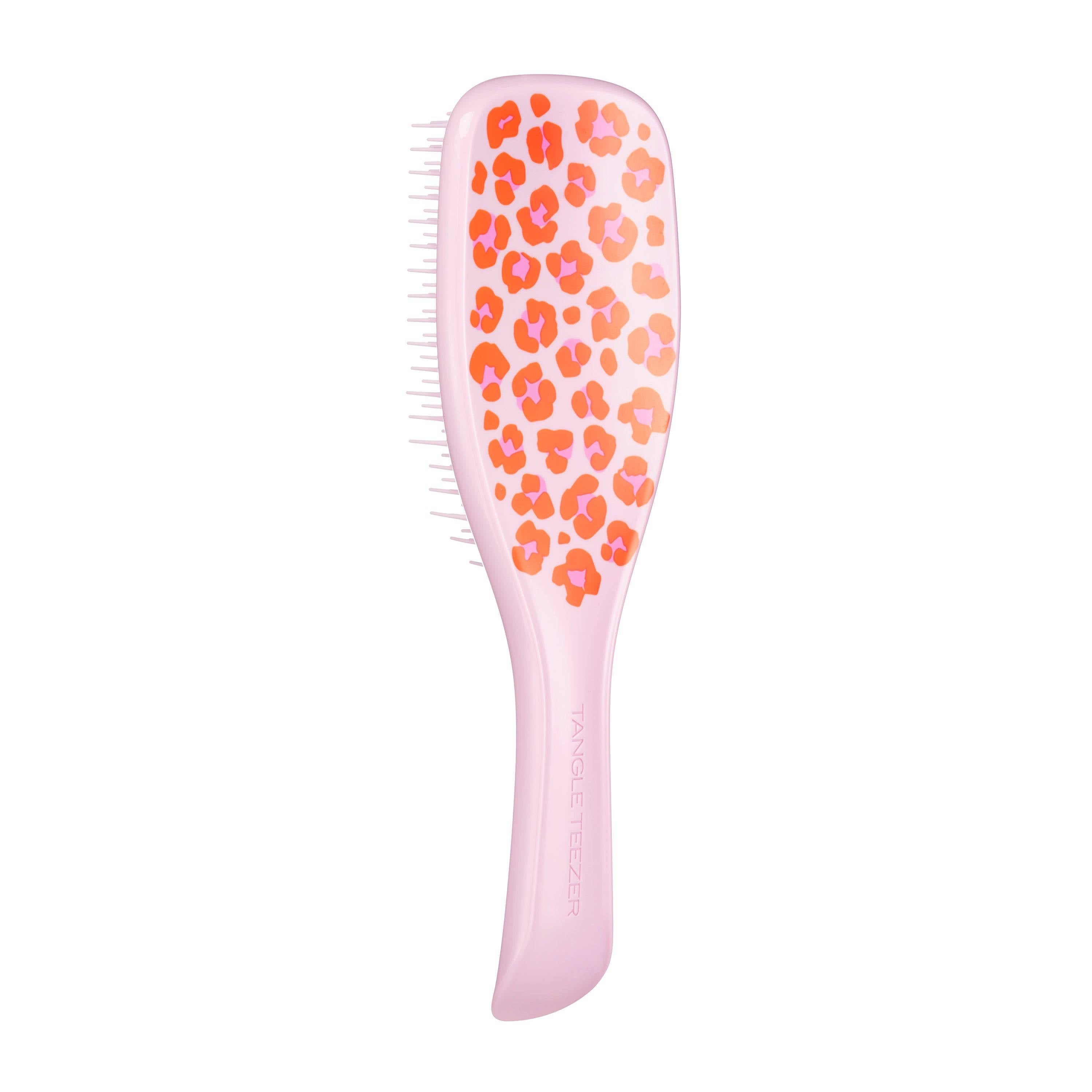 Tangle Teezer The Ultimate Detangler Vibrant Leopard Printed hairbrush with a pink base and red leopard print design. Designed for wet and fragile hair, it features two-tiered teeth technology for effortless detangling and reduced breakage.