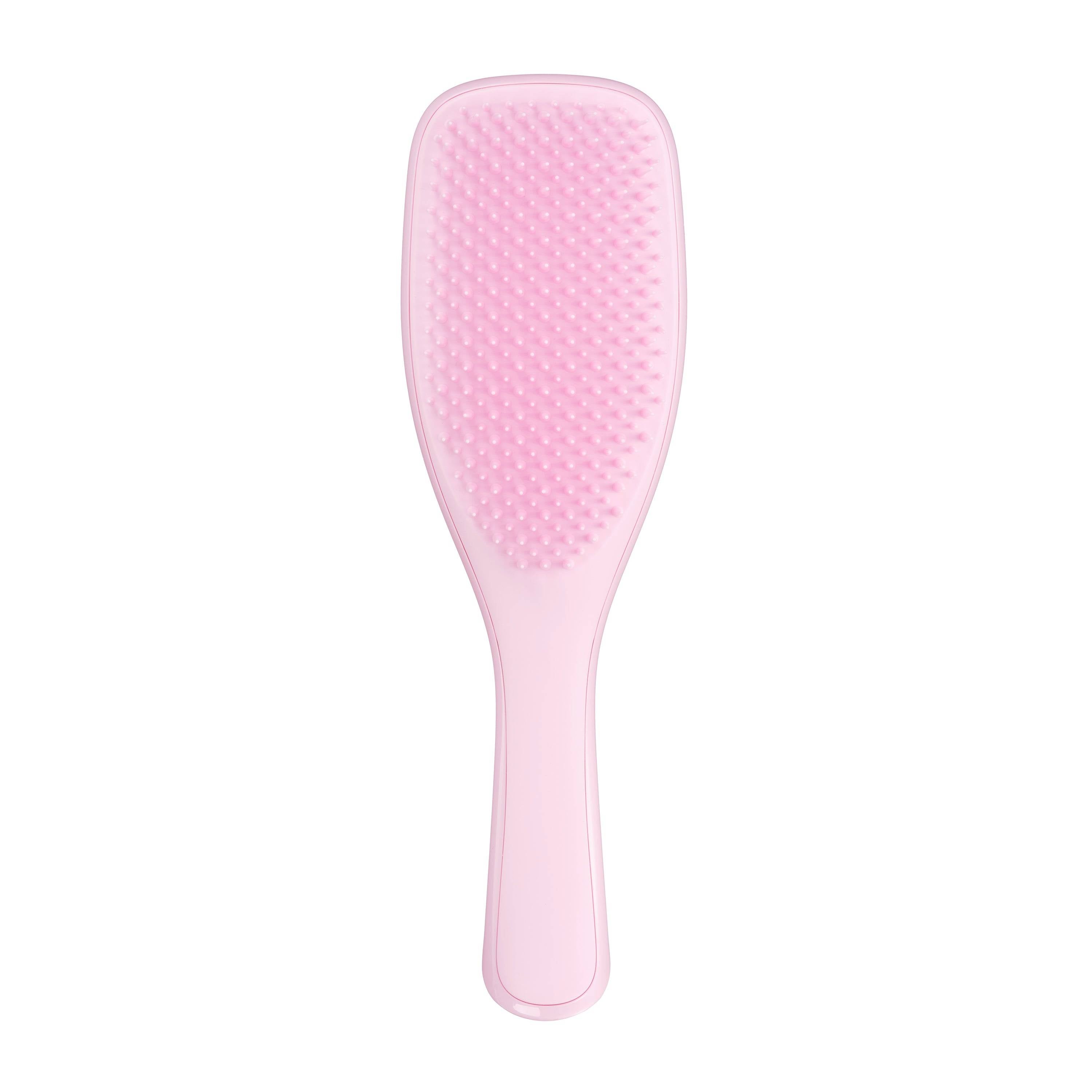 Tangle Teezer The Ultimate Detangler in pastel pink, designed for wet and fragile hair. Features two-tiered teeth technology for effortless detangling and reduced breakage.