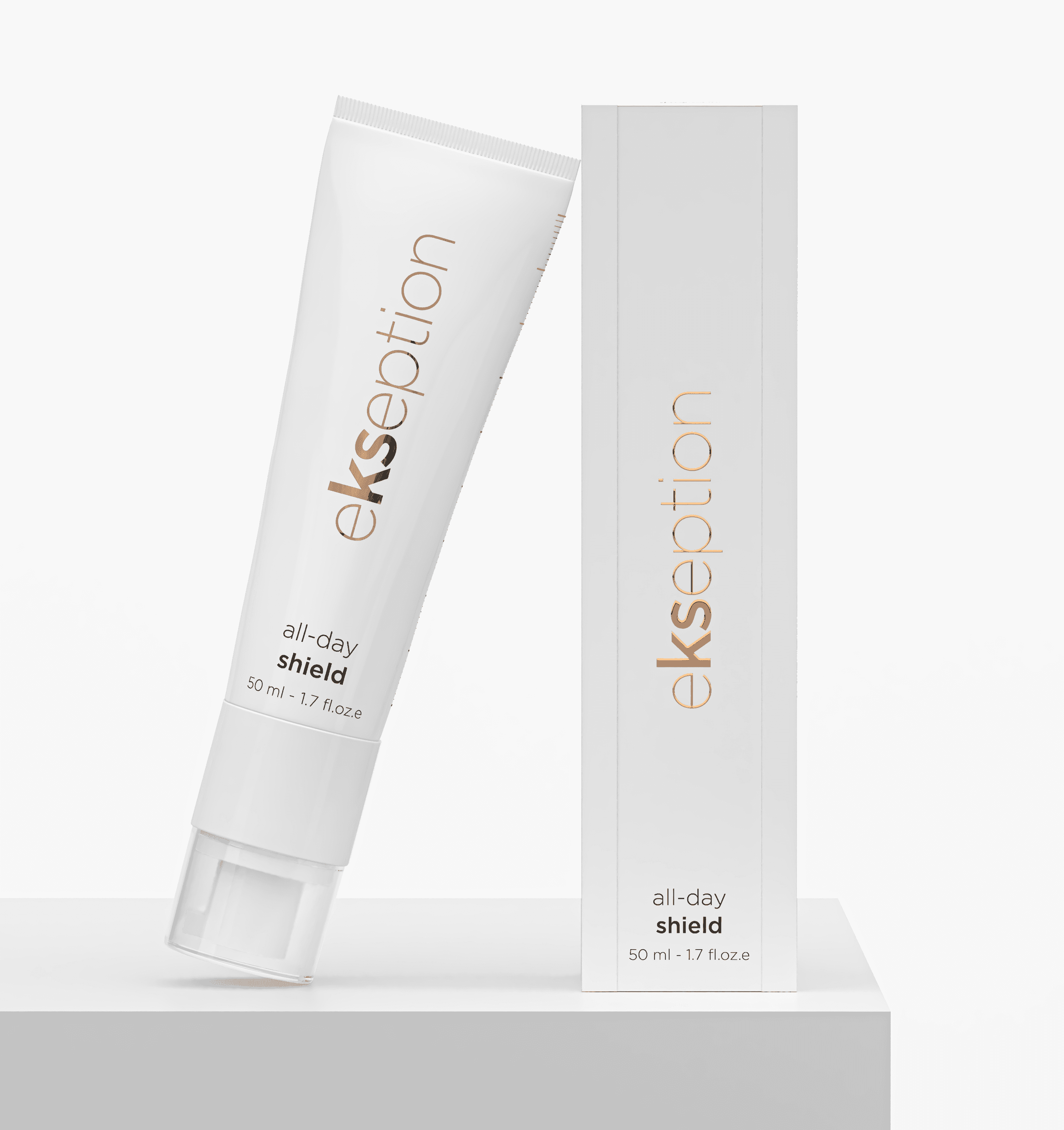 Ekseption All Day Shield SPF50+ 50 ml sunblock displayed on a white platform with its packaging. Ideal for all skin types, offering sun protection and skincare benefits.