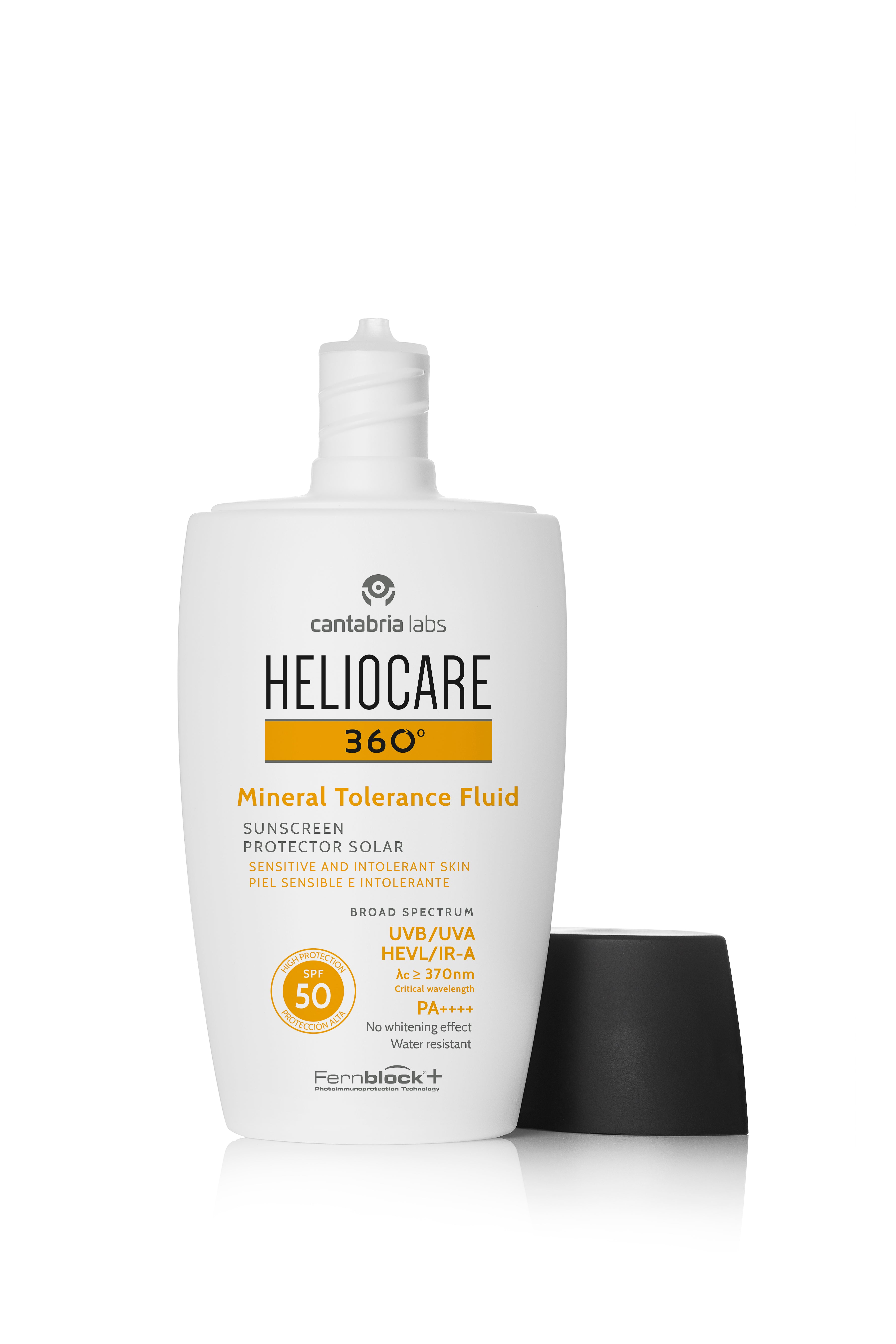 Opened Heliocare Mineral SPF50 bottle with applicator, showing lightweight texture ideal for sensitive and intolerant skin with Fernblock technology.