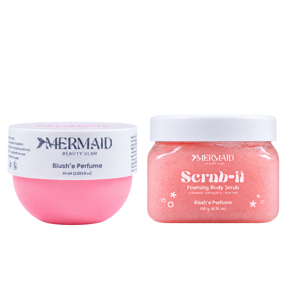 Pink body scrub and body butter jars from Mermaid Beauty Glam, labeled 'Scrub-it' foaming body scrub and 'Blush'e Perfume, moisturizing and exfoliating skincare set