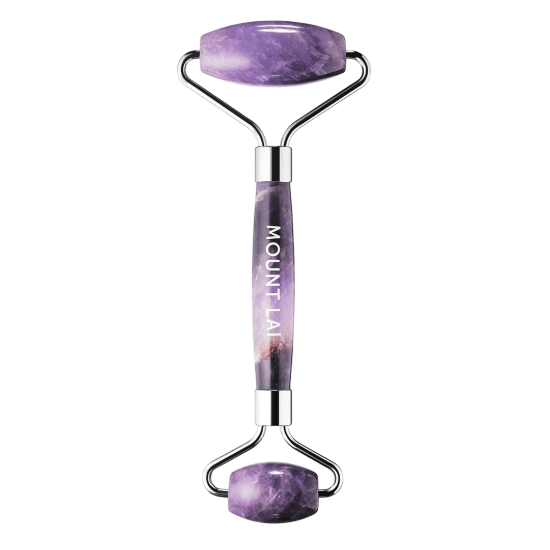 Mount Lai The Amethyst Facial Roller, a dual-ended skincare tool made from amethyst stone, designed to reduce puffiness and enhance circulation.