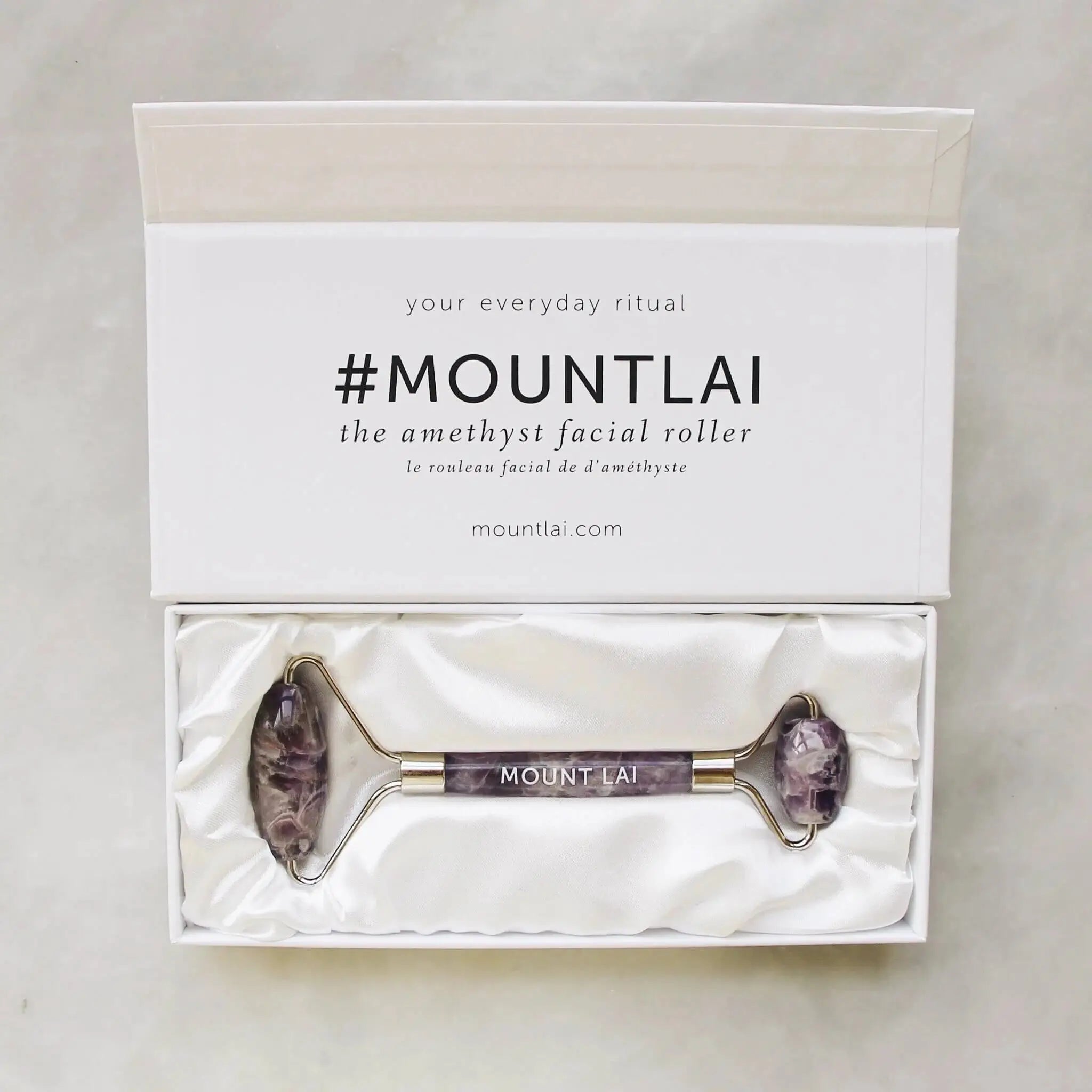 Mount Lai The Amethyst Facial Roller in an elegant gift box, featuring a satin-lined interior for a premium skincare experience.