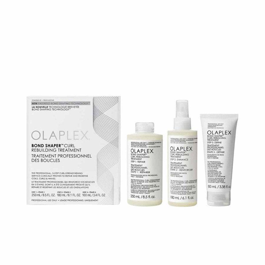 Olaplex Curl Bond Treatment Kit with three hair care products and packaging, formulated to rebuild and define curls with lasting shine and frizz control.