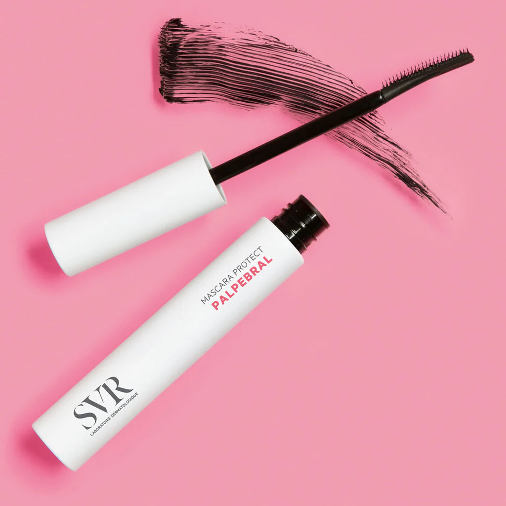 SVR Palpebral Protect Mascara shown with black lash strokes on pink background, highlighting its smooth application for sensitive eyes.