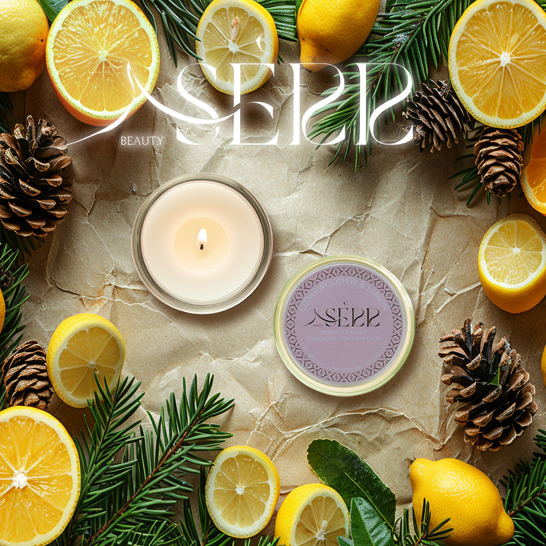 SerrBeauty Organic Cedarwood, Fir & Lemon Beeswax Scented Candle surrounded by fresh lemons, fir branches, and pinecones, evoking a crisp, natural fragrance.