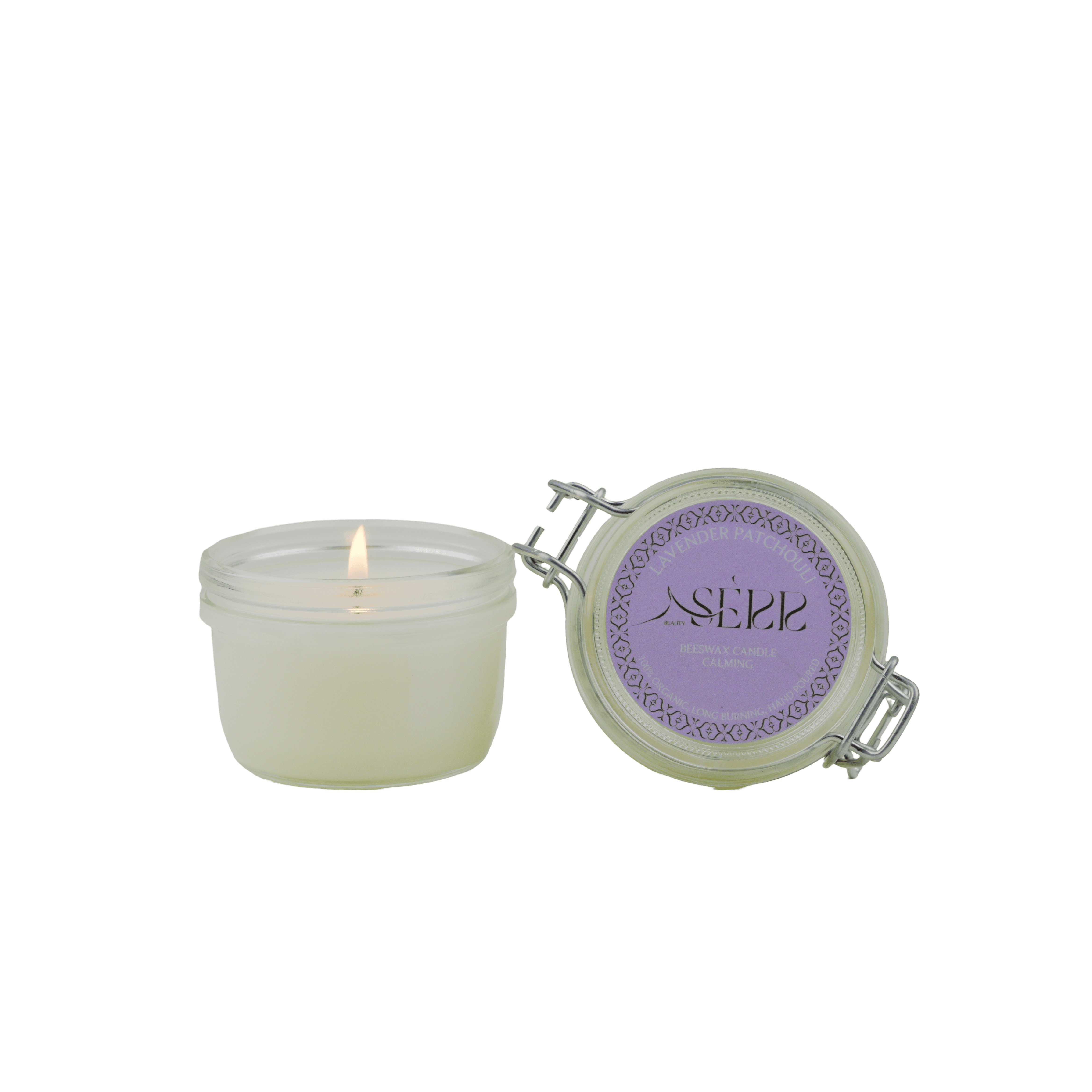 SerrBeauty Organic Lavender & Patchouli Beeswax Scented Candle 125 G in a glass jar with a lit wick, featuring a secure clasp lid with a purple label.