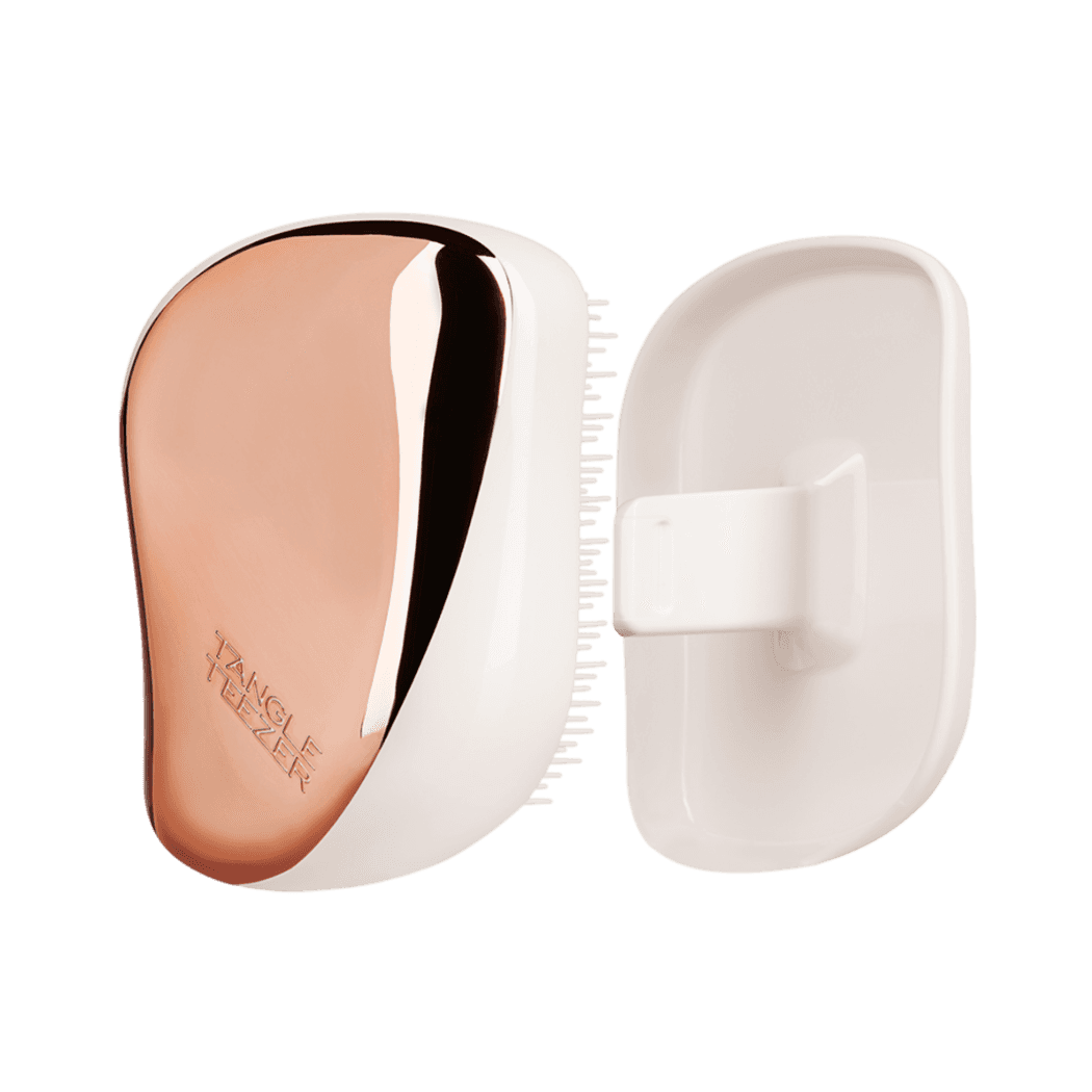 Tangle Teezer Compact Styler Rose Gold-Ivory hairbrush with a sleek rose gold finish and protective cover. Ideal for detangling and smoothing all hair types.
