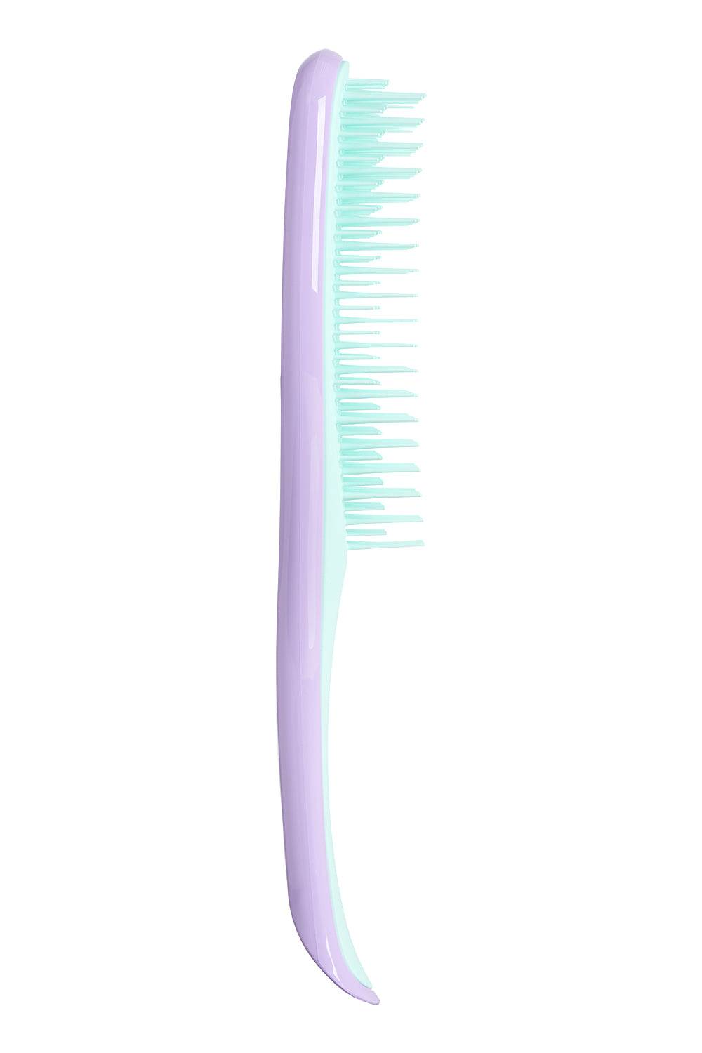 Tangle Teezer The Ultimate Detangler in lilac-mint, a wet hairbrush designed for all hair types. Features two-tiered teeth technology for effortless detangling and reduced breakage.