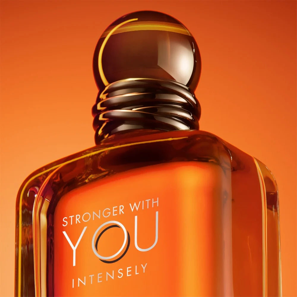 Close-up of Armani Stronger With You Intensely EDP bottle showcasing its elegant amber-toned design, perfect for luxury men’s fragrance collections.
