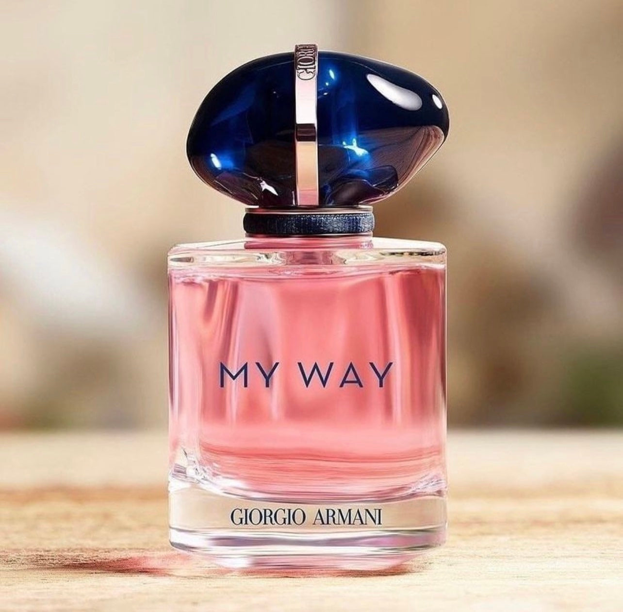 Giorgio Armani My Way - Perfume | Floral Fragrance 90ml close-up of elegant bottle with pink liquid and blue cap, perfect for luxury scent lovers.