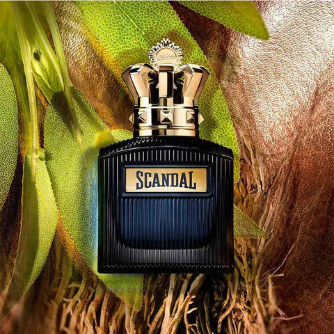 Jean Paul Gaultier Scandal Intense Perfume 150 ml bottle displayed on natural leaves, highlighting its floral, long-lasting fragrance appeal.