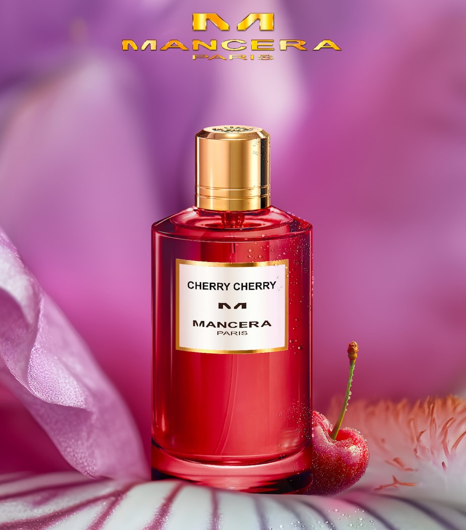 Mancera Cherry Cherry Eau De Parfum 120 ml showcased with a cherry and floral background, emphasizing its sensual and elegant scent profile.