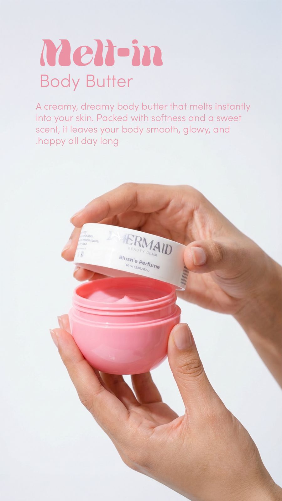 Hands opening Mermaid Melt-It Body Butter Blush, showcasing creamy texture for deep hydration and radiant skin softness.