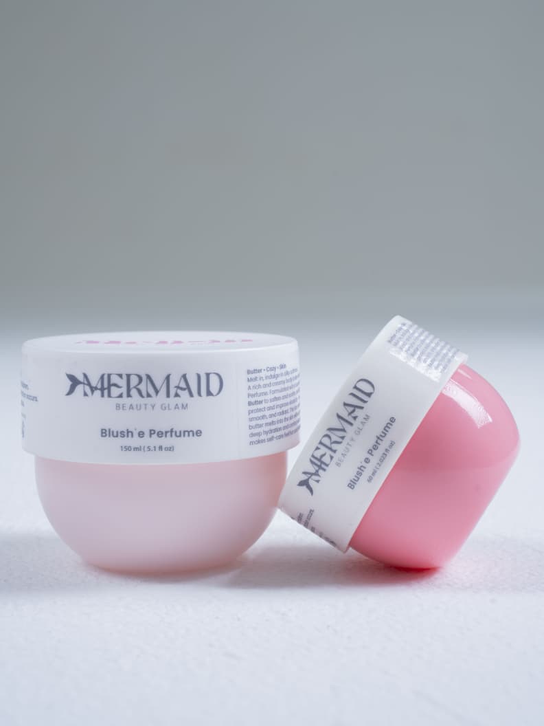 Mermaid Melt-It Body Butter Blush 150ml jars in pink and blush tones, ideal for very dry skin with long-lasting moisturizing effect.