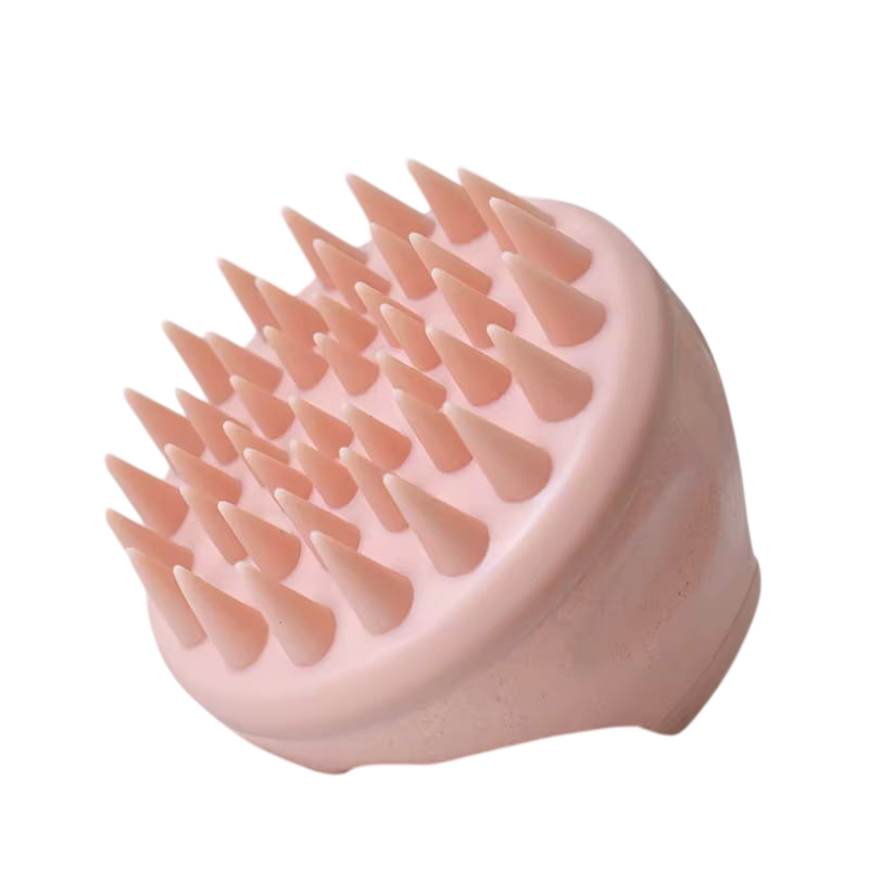 Mermaid Scalp Massager in soft pink with silicone bristles for exfoliating and boosting hair health. Ideal for all hair types and daily scalp care.