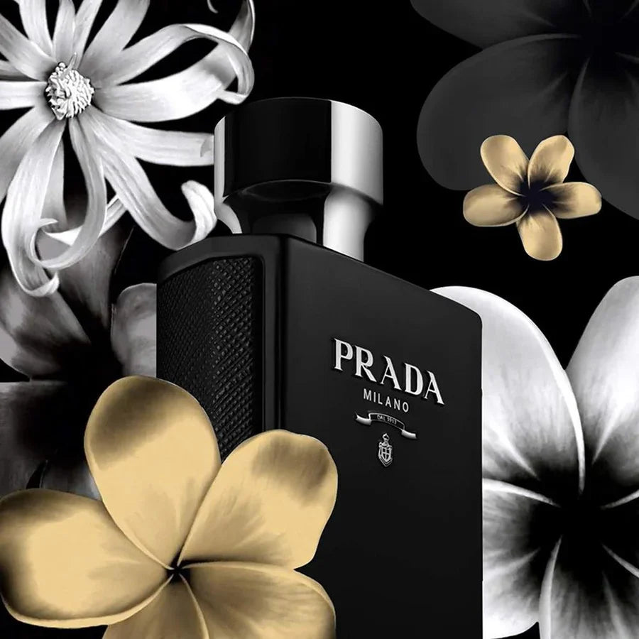 Prada L'Homme Intense EDP bottle surrounded by floral elements, highlighting its luxurious and sensual oriental woody fragrance for men.