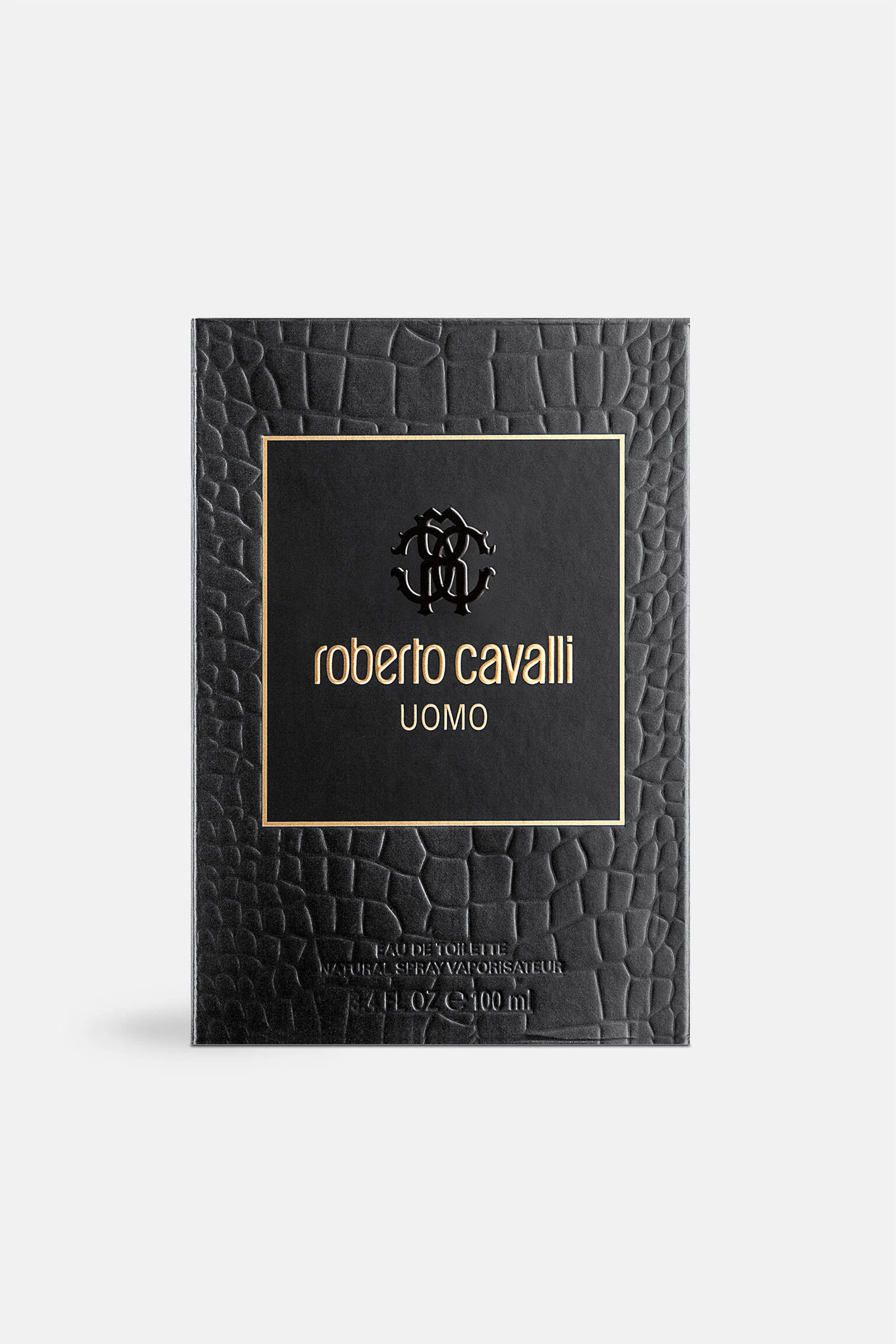 Close-up of Roberto Cavalli UOMO EDT 100ml box featuring embossed black texture and gold branding, from the 2016 launch.