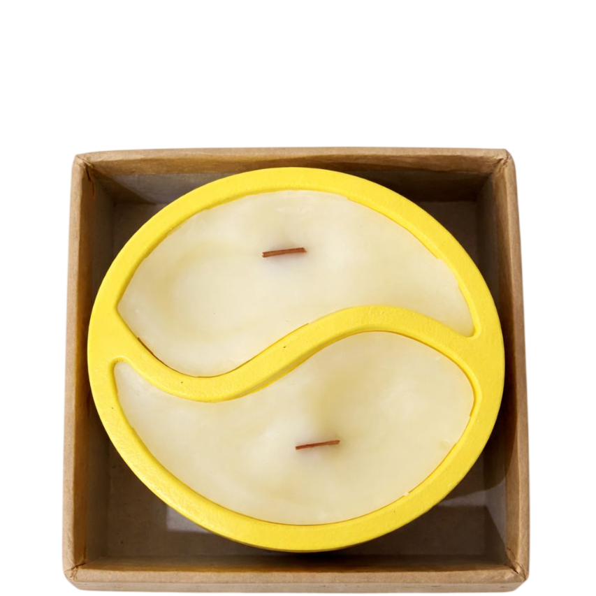 Top view of SerrBeauty Summer Glow Candle showing yin-yang dual-scent wax design with two wooden wicks in a yellow ceramic container.