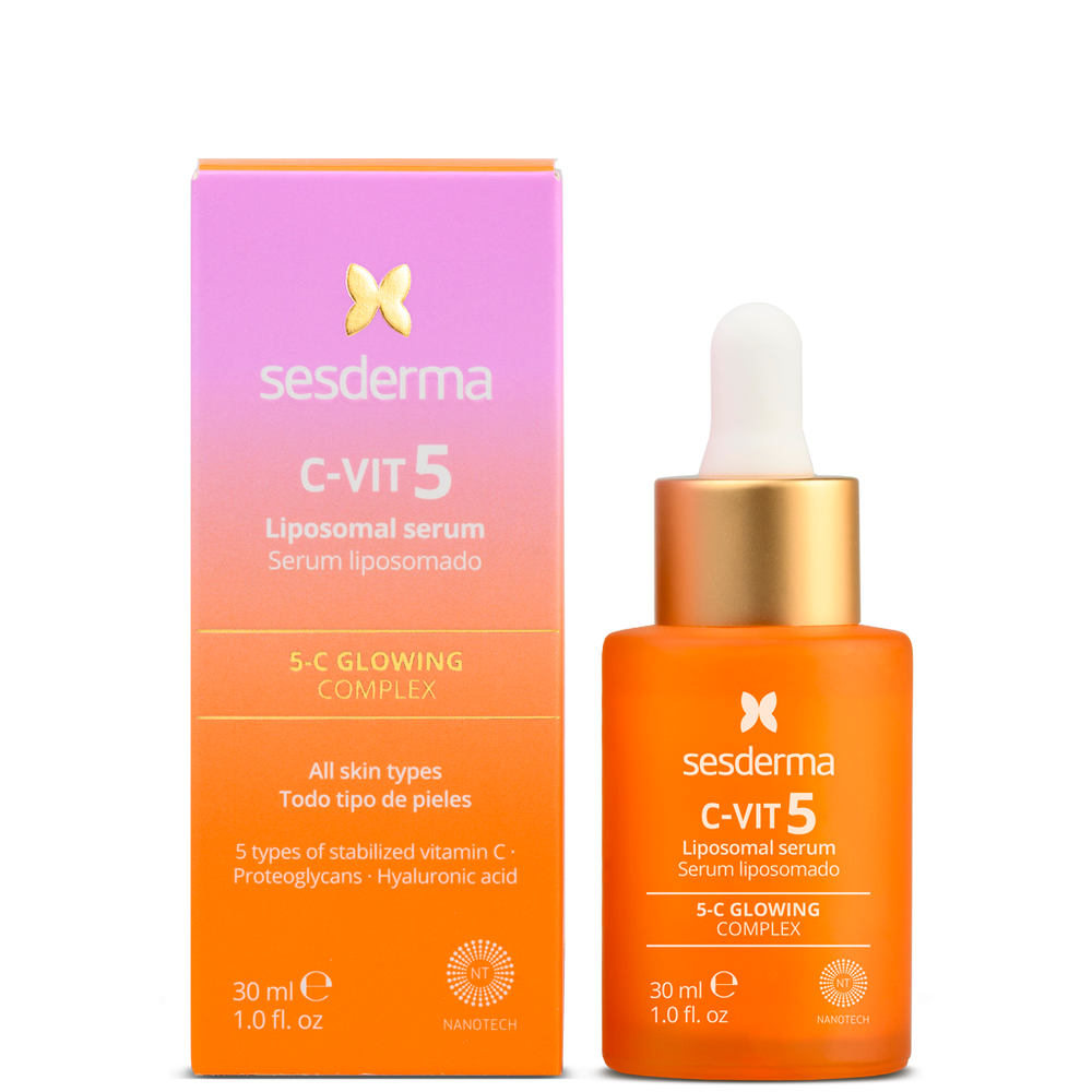 Bright orange Sesderma C-VIT 5 Liposomal Serum bottle with white dropper cap next to pink and orange packaging box, all for skin brightening