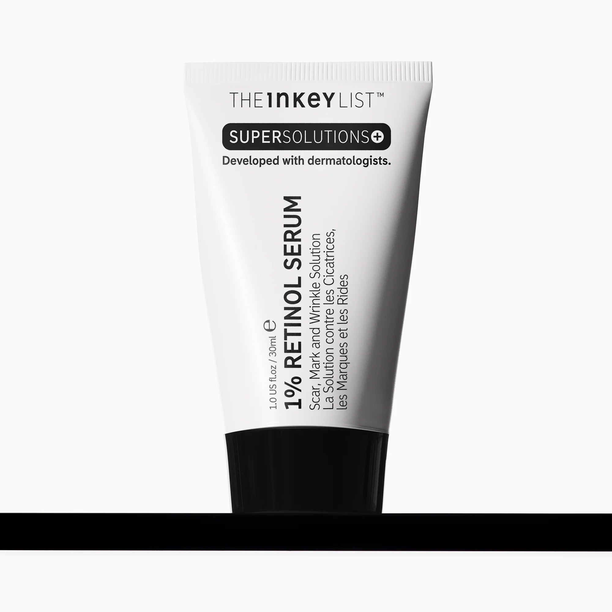 The Inkey List 1% Retinol Serum tube labeled for scar, mark, and wrinkle care; dermatologist-developed anti-aging skincare solution.