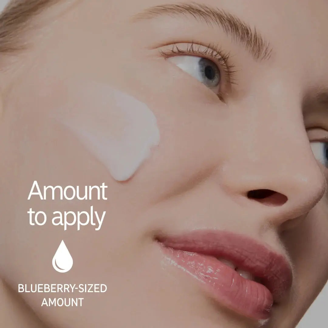 A woman applying The Inkey List Bio-Active Ceramide Moisturizer, showing the recommended blueberry-sized amount for optimal hydration and skin barrier support.