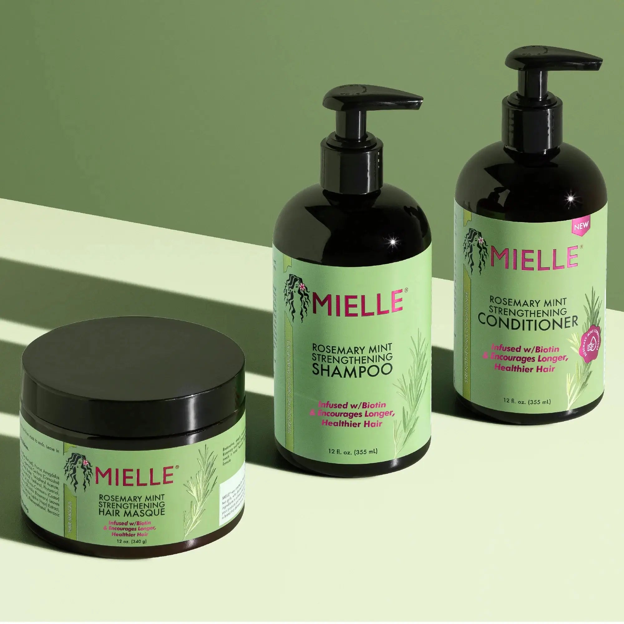 Mielle Rosemary Mint Strengthening Hair Care set featuring shampoo, conditioner, and hair masque, designed to promote healthy hair growth and reduce breakage.
